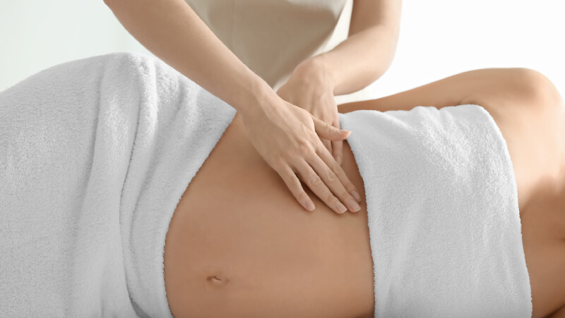 cách massage giảm đau lưng cho bà bầu