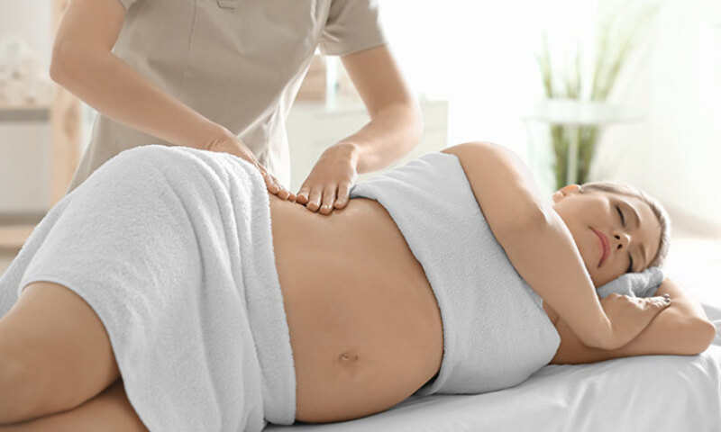 bà bầu có nên dụng máy massage xung điện